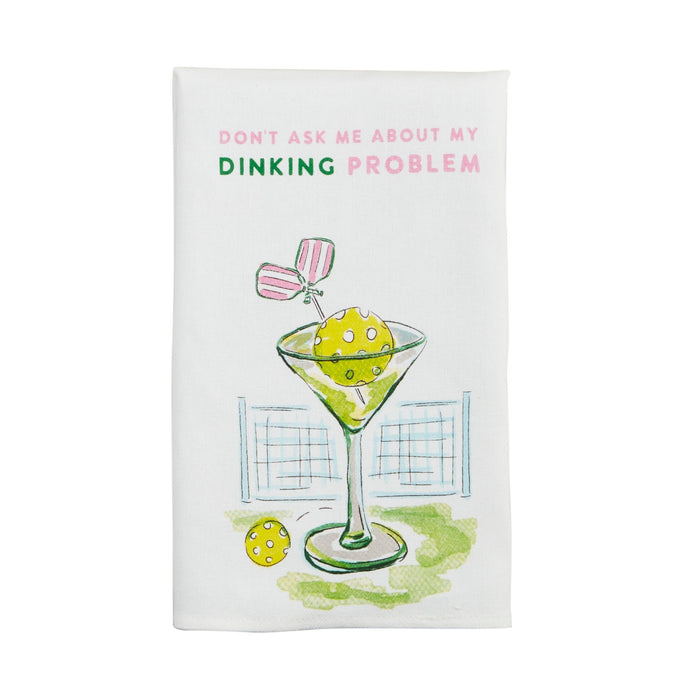 A white cotton hand towel with a colorful graphic design featuring a martini glass and text reading 'DON'T ASK ME ABOUT MY DINKING PROBLEM'.