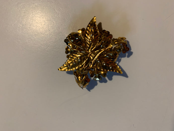 Enameled Metal Black Flower and Rhinestone Brooch circa 1960s