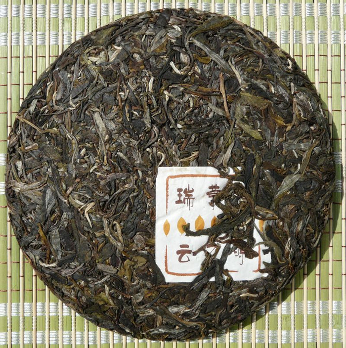 2009 Yunnan Sourcing * Road to Yi Wu "Man Zhuan" Raw Pu-erh Tea Cake | Yunnan Sourcing Tea Shop
