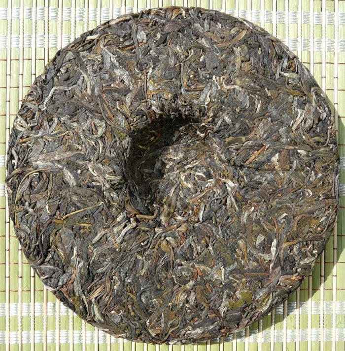 2009 Yunnan Sourcing * Road to Yi Wu "Man Zhuan" Raw Pu-erh Tea Cake | Yunnan Sourcing Tea Shop