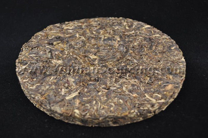 2010 Xiaguan FT "Yi Ming Jing Ren" Raw Pu-erh tea cake - Yunnan Sourcing Tea Shop