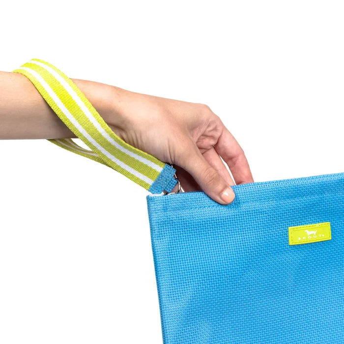 Hand holding a blue bag with a yellow strap against a white background