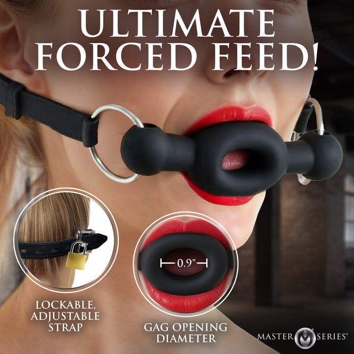 Tapered feeding opening on FORCED silicone gag for playful couples teasing
and feeding play