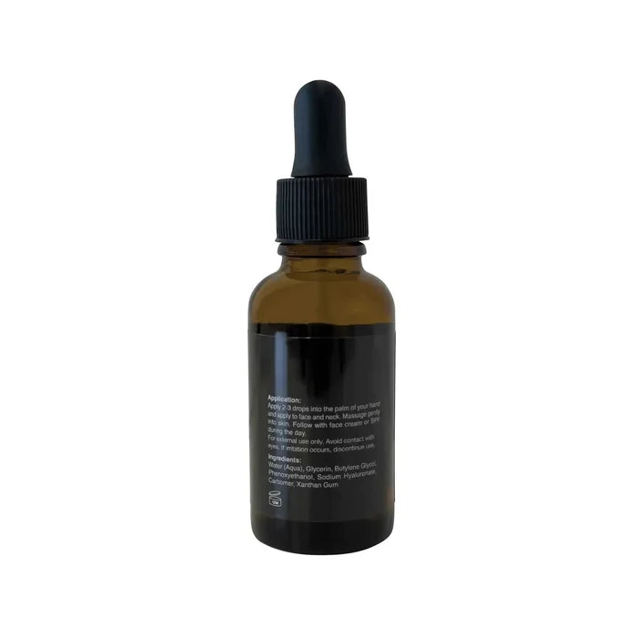 Hyaluronic Acid Serum in an amber glass dropper bottle with a black cap and dark label