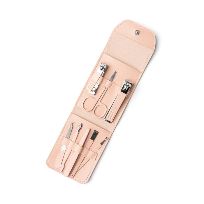 beige manicure set displayed against a white background