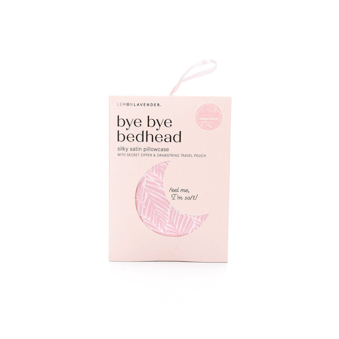 Silky satin pillowcase packaging with 'bye bye bedhead' text on a white background