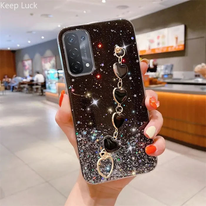 a woman holding up a phone case with a phone holder