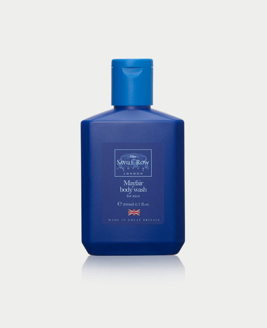Blue bottle of Savile Row body wash on a white background