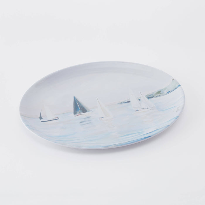 Platter with sailboat pattern against white background