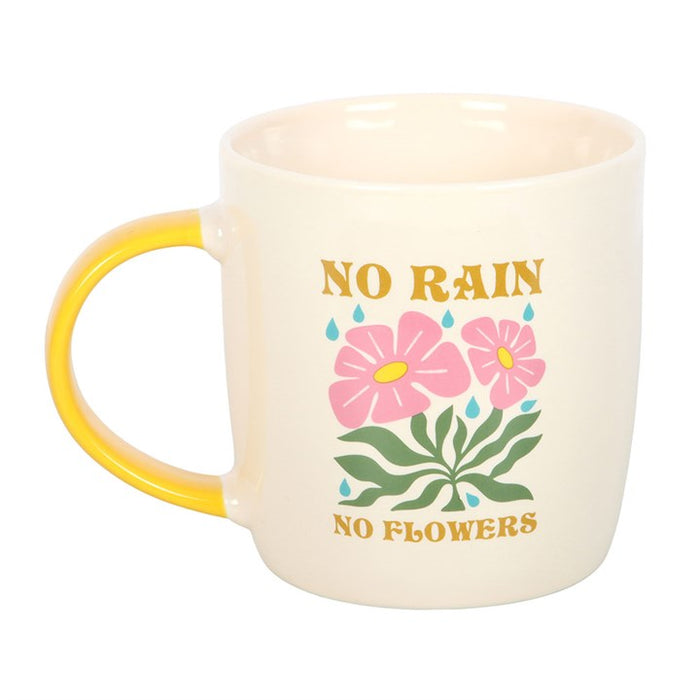 no rain no flowers ceramic mug shown from reverse side with floral design