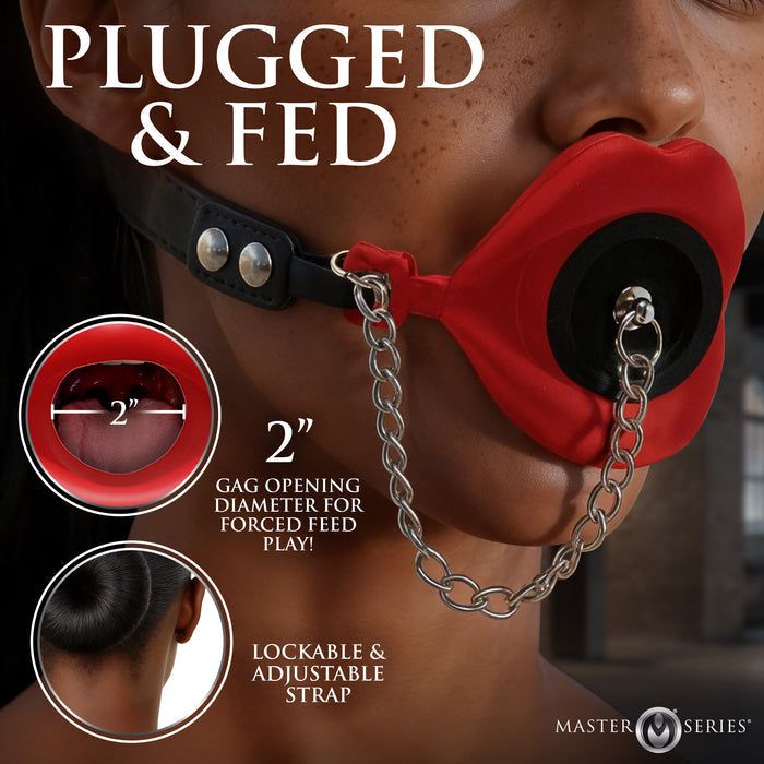 Adjustable black locking strap on red Plugged feeding gag for comfortable secure
couples fit
