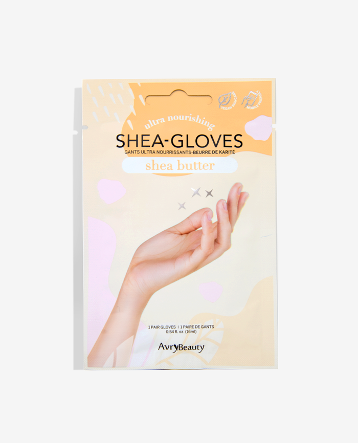 Packaging of Shea Butter Gloves showing a pair of manicured hands wearing the gloves with a focus on the brand and product benefits.