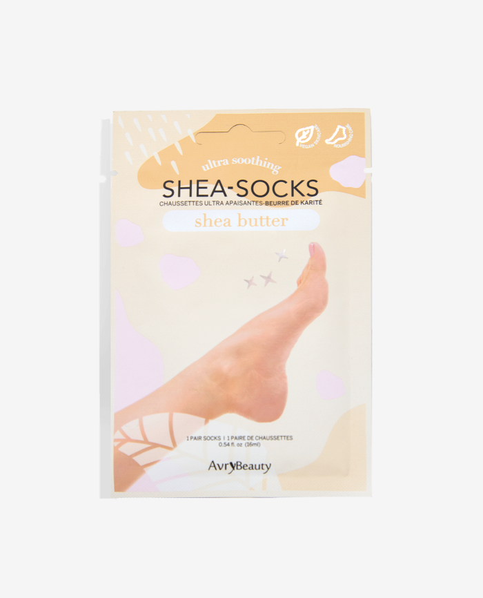 Packaging of Shea Butter Socks by Avry Beauty showing the product and brand name with an image of a foot wearing the sock.