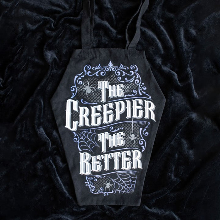 gothic coffin bag featuring bold slogan displayed on black fabric background
