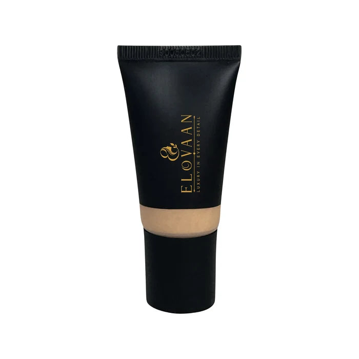 Tinted Moisturizer - Porcelain in a black squeeze tube with gold lettering and a visible beige product band