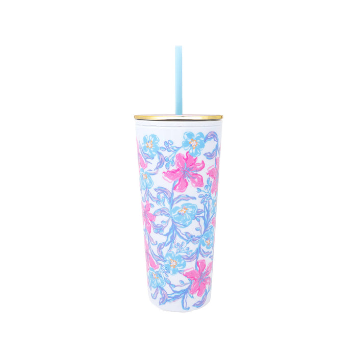 Floral-patterned tumbler with a straw on a white background